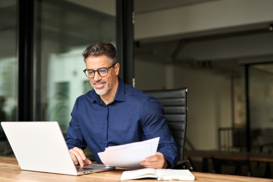 Man looking at energy bill